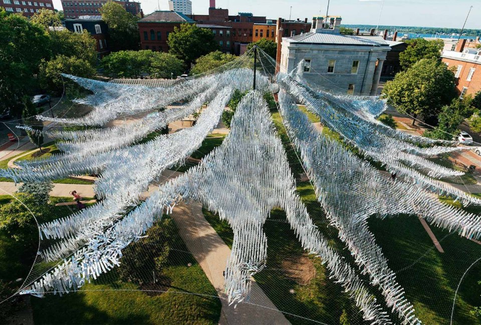 Inspired by the movements of schools of fish, this outdoor sculpture moves with the seaside winds in New Bedford. Photo courtesy of Poetic Kinetics