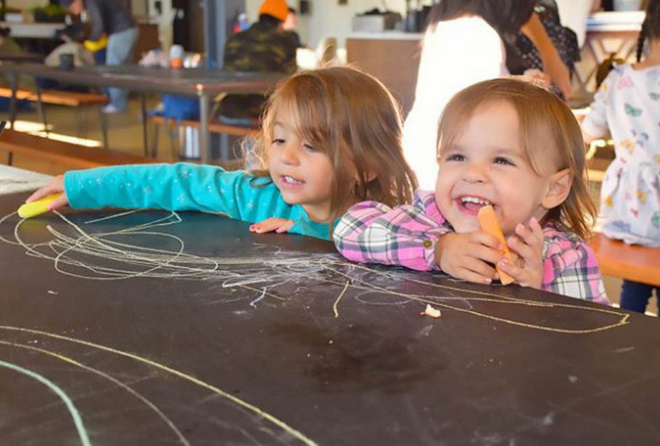 Draw on the tables at the Social Play Haus. Photo by Jaime Sumersille