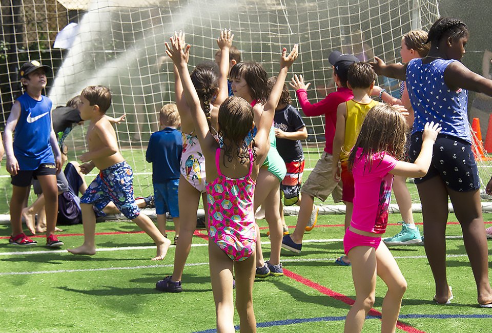 Come out and play at Sprinkler Day at Asphalt Green. Photo courtesy of Asphalt Green