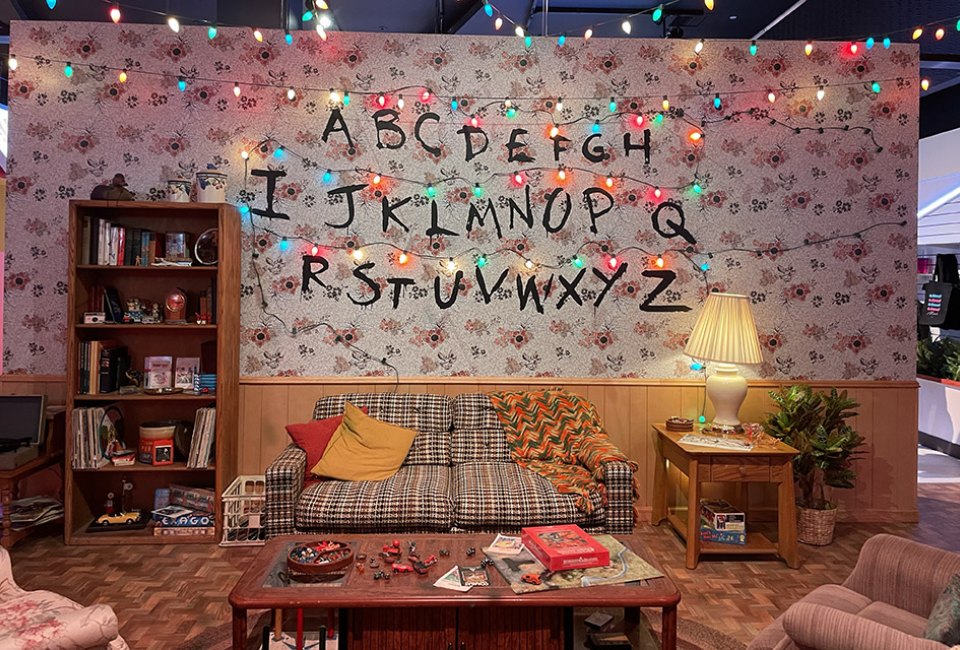 The new Stranger Things pop-up store invites you inside iconic locations from the show, including the Byers' living room. 