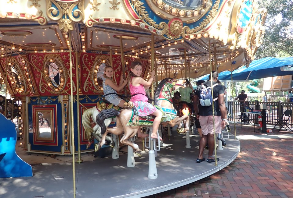 Riding the carousel at Sugar Sand Park, photo by the author