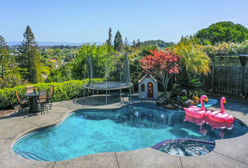 Rent a gorgeous backyard pool like this for your family for an hour or a day. Photo courtesy of Swimply