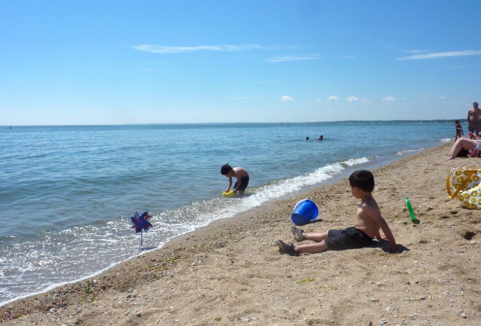 Kids wait for the tide to go out for critter catching at Hammonasset Beach State Park.  