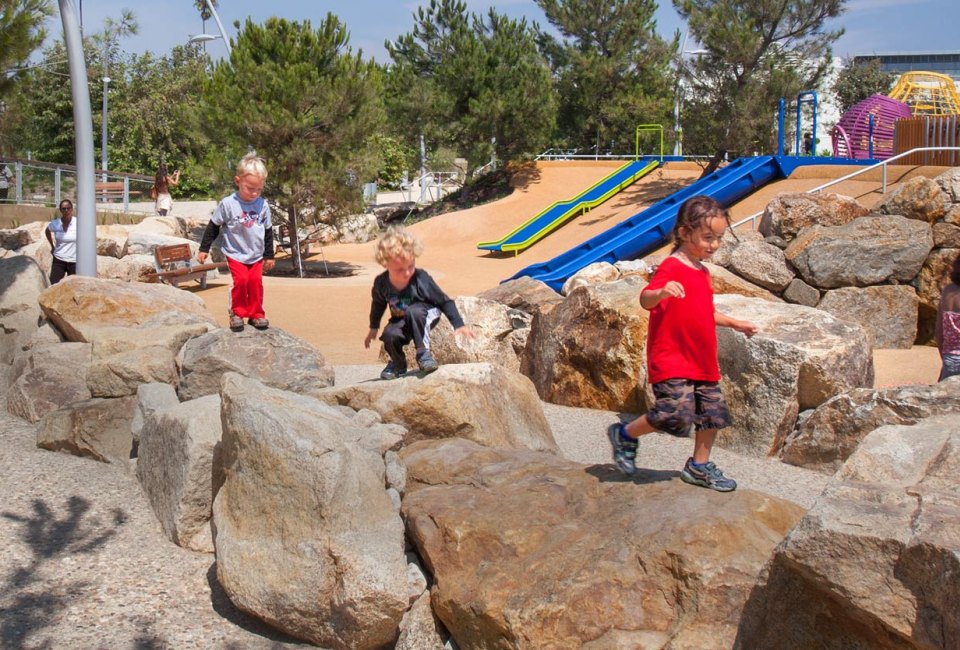 Kids love the rocks and climbing structures at Tongva Park. Photo courtesy of James Corner Field Operations
