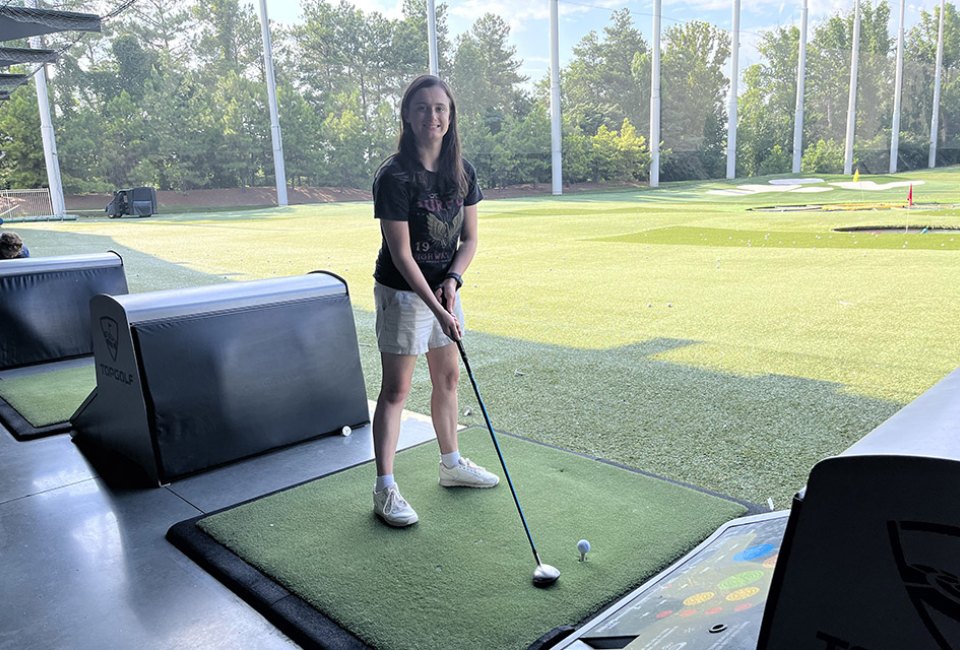 Introduce kids and teens to a sport like golf while having a family hang at Topgolf Atlanta.