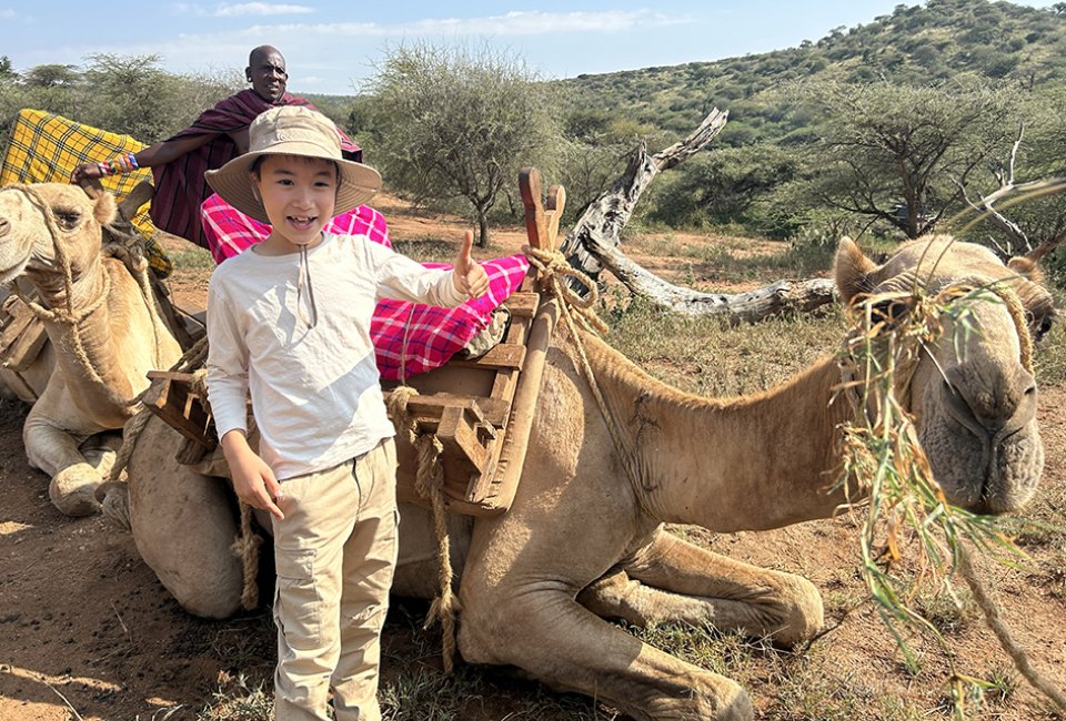 Embrace the slow rhythm of a camel ride on a safari adventure. Photo by Diana Kim