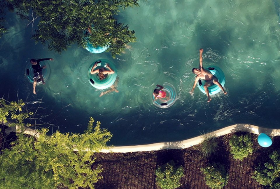 Float down the lazy river at Hyatt Regency Lost Pines Resort and Spa. 