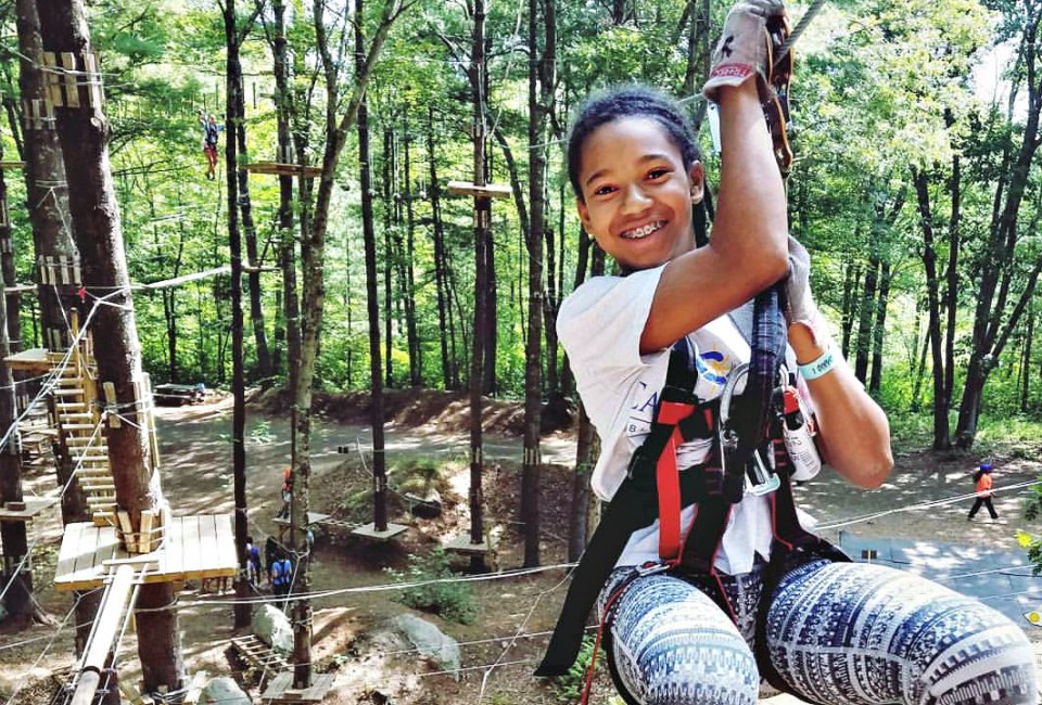 Kids will love to zip between the trees in Canton. Photo courtesy of TreeTop Adventures