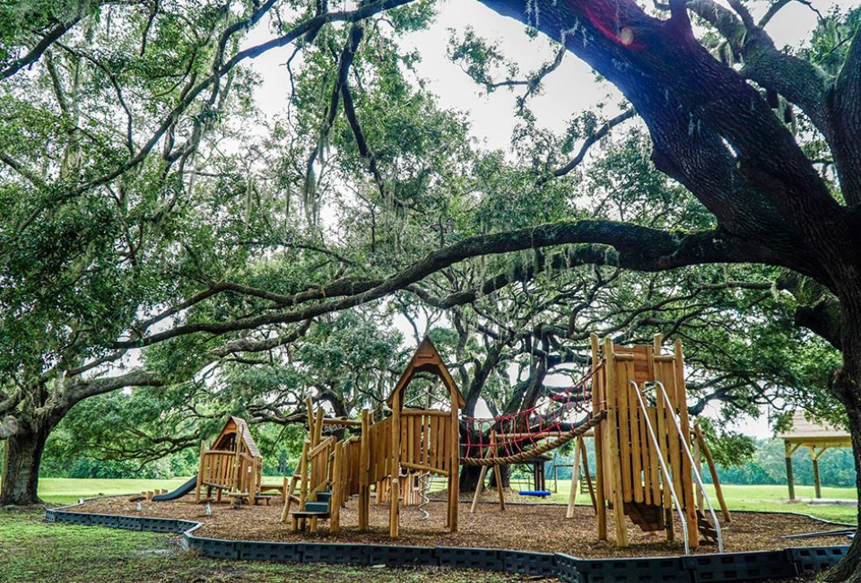 The playground at Tucker Ranch Preserve sports a treehouse feel surrounded by nature.