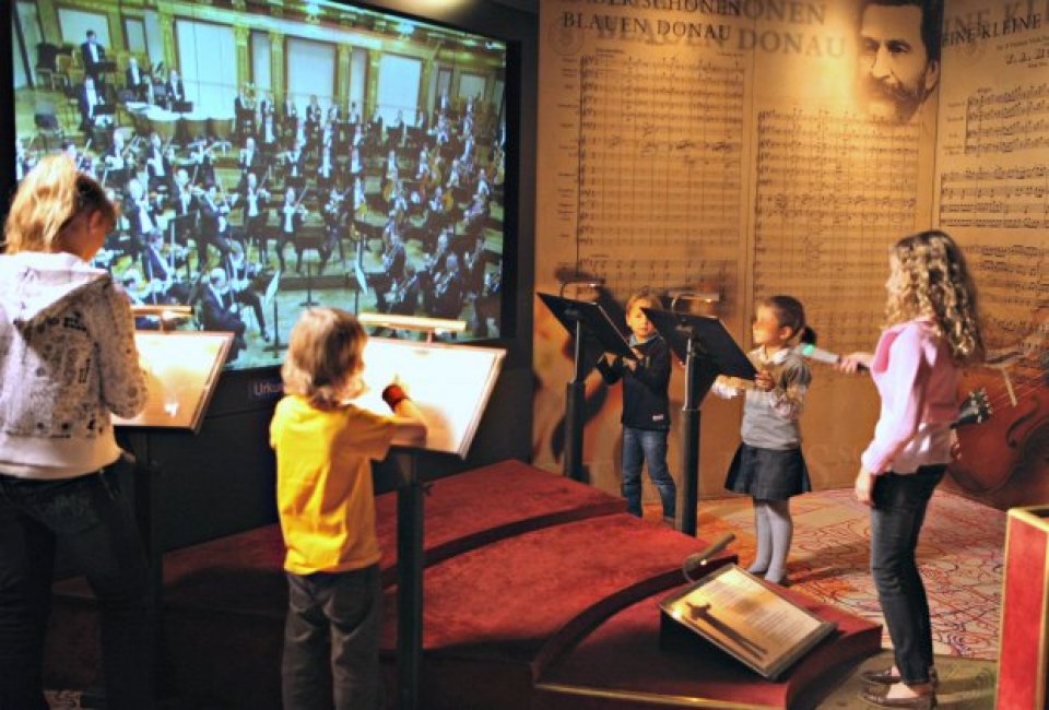The kids can have a go at conducting the orchestra at Vienna's Haus der Musik. Photo courtesy of Vienna Tourism