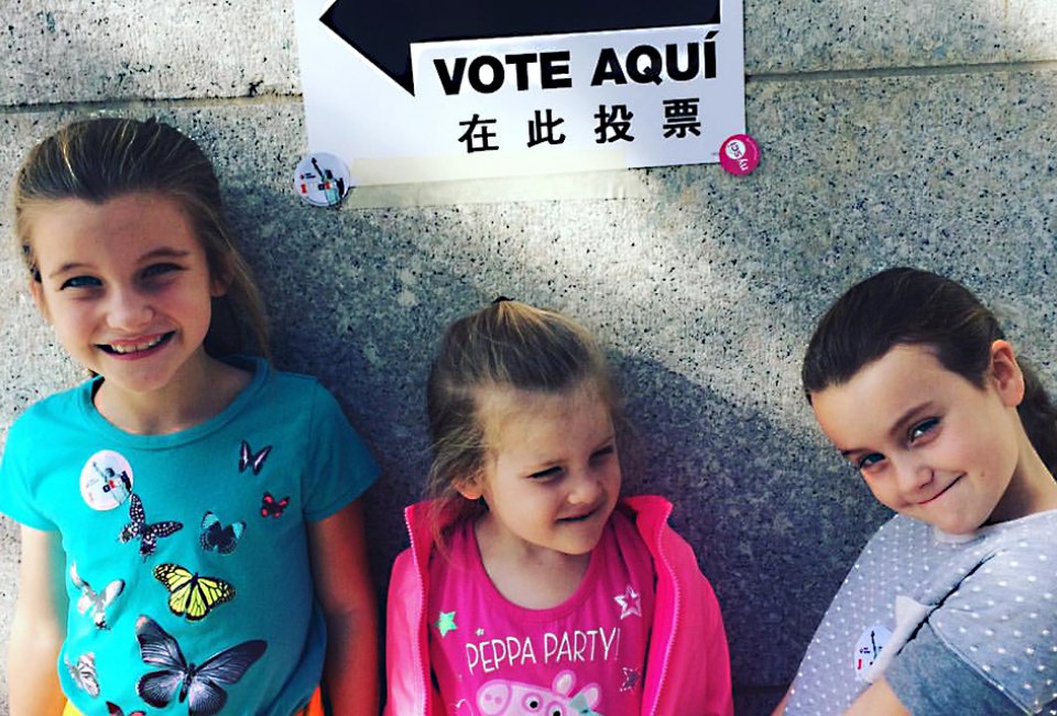 Bring the kids to vote with you on Election Day. Photo by Kate Lewis Andrews