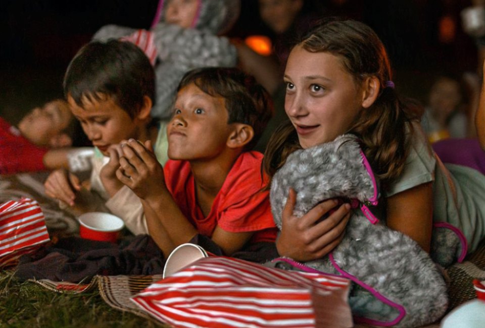 Kids enjoying movies. Photo courtesy of Canva