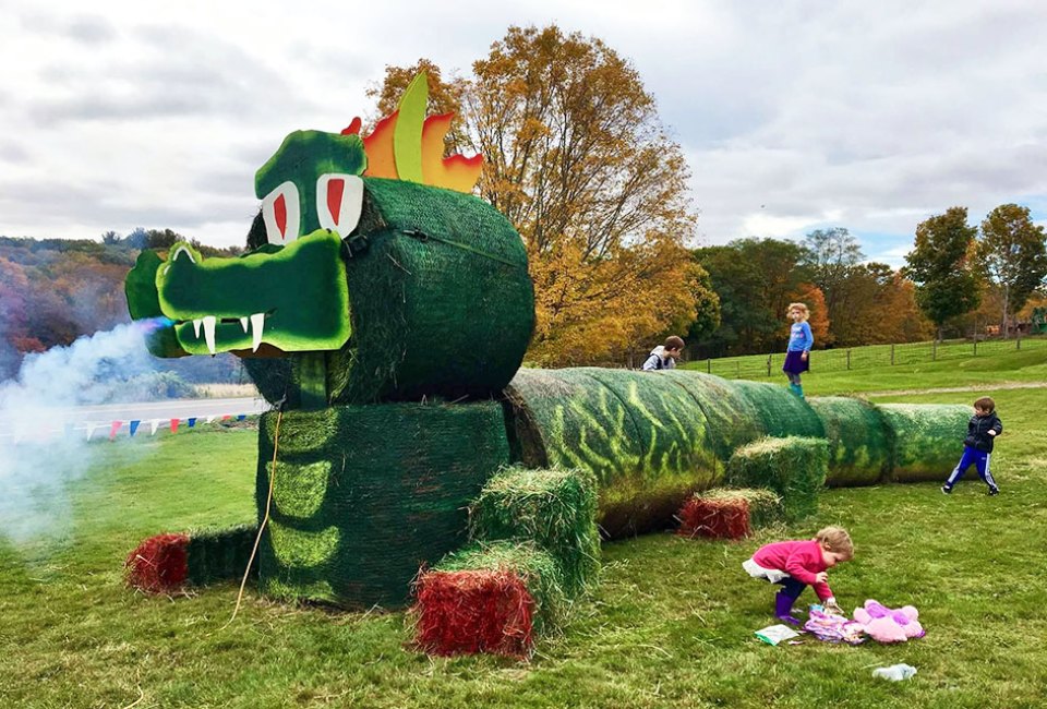 There's a climbable hay dragon, tractor exhibits, a corn maze, and more at the Soukup Farms Fall Festival. Photo courtesy of the farm.