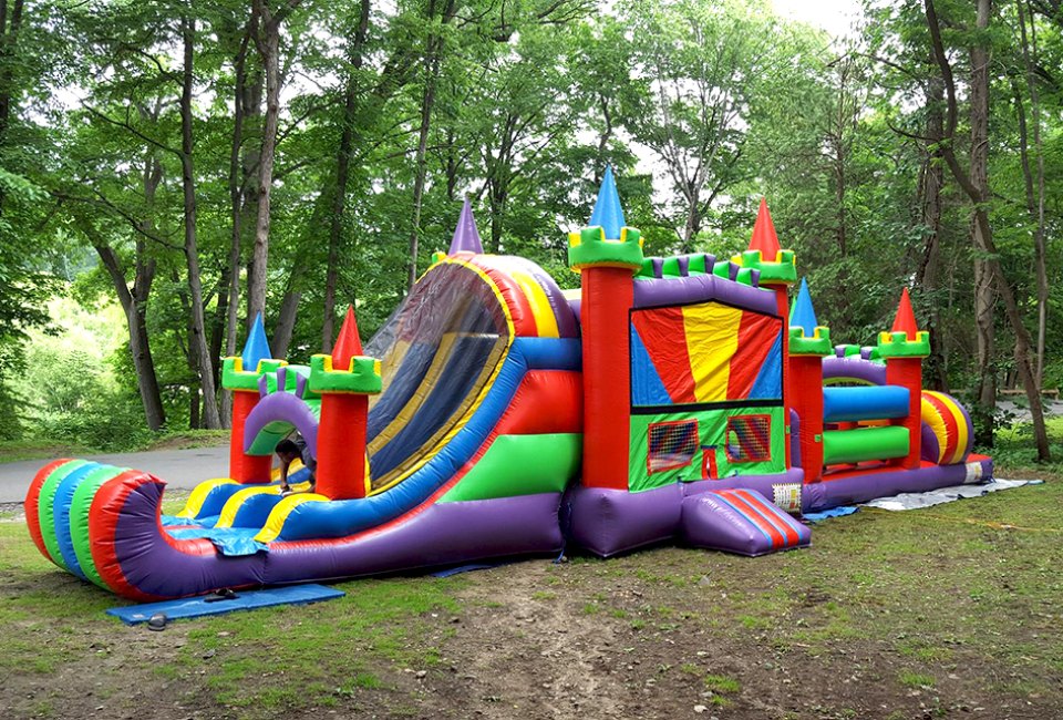 Fiesta Bounce has elaborate and massive bouncy houses sure to please energetic birthday kids.