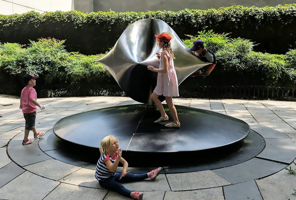 Pondering art and gravity at the Rose Center for Earth and Space. Photo by Winston Johnson