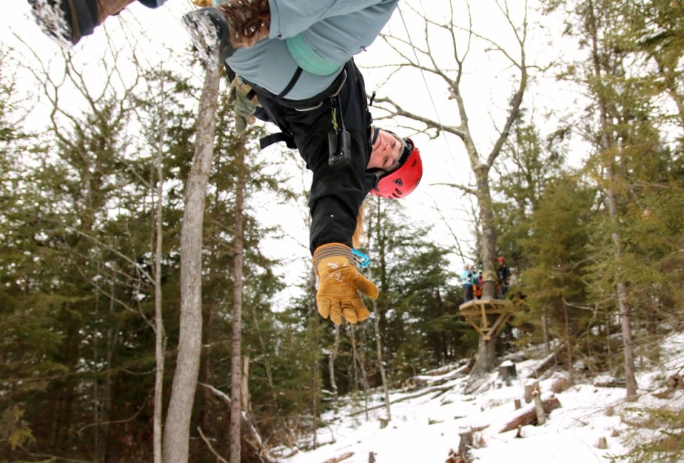 What is this crazy kid doing in the snow? Ziplining, of course! Photo courtesy of Alpine Adventures NH via Facebook