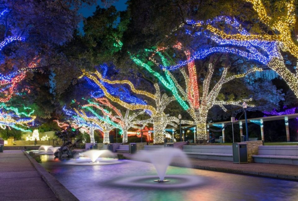The promenade at the Houston Zoo is brilliantly lit during the holidays at Zoo Lights.